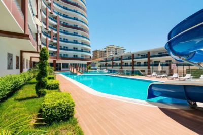 Zariadený 2-izb. apartmán v komplexe s mnohými aktivitami Alanya - Mahmutlar APM - 19